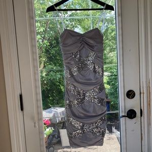 B. Darlin form fitting strapless mini dress